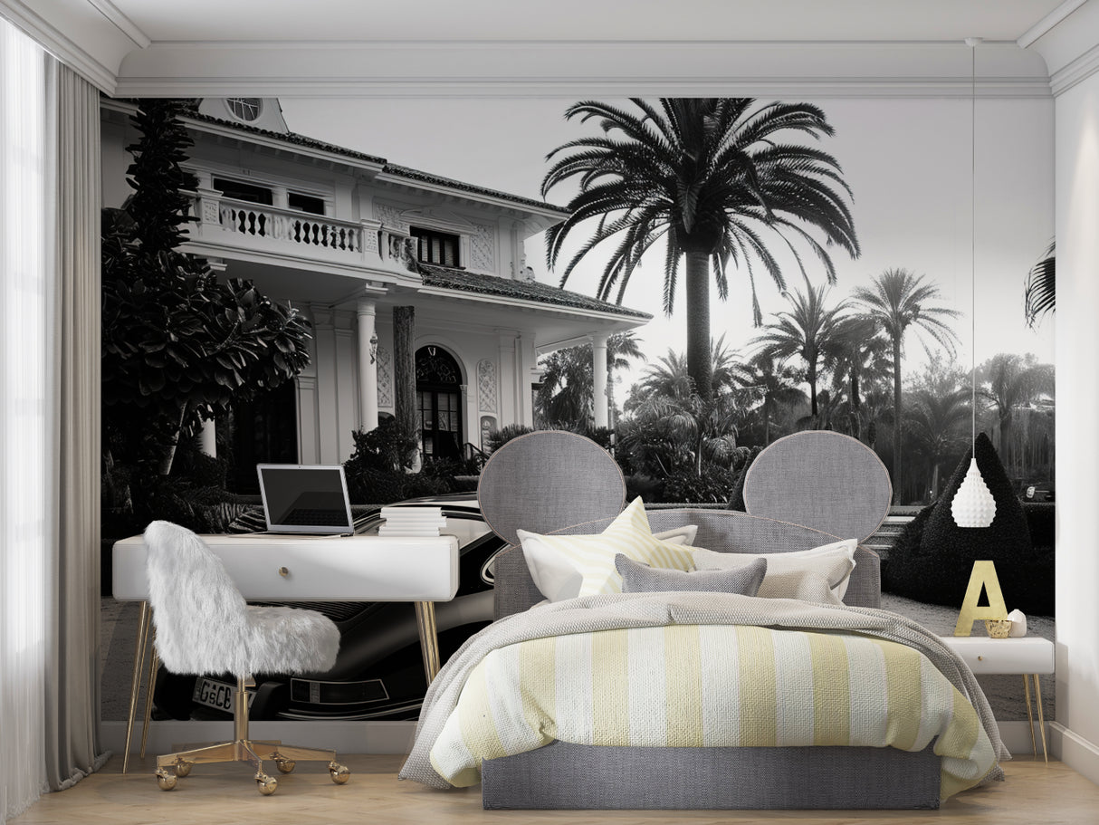 Black and white vintage car mural adding elegance to home office with wooden desk