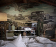 Vintage car wallpaper in modern living room showing classic automobiles against desert backdrop