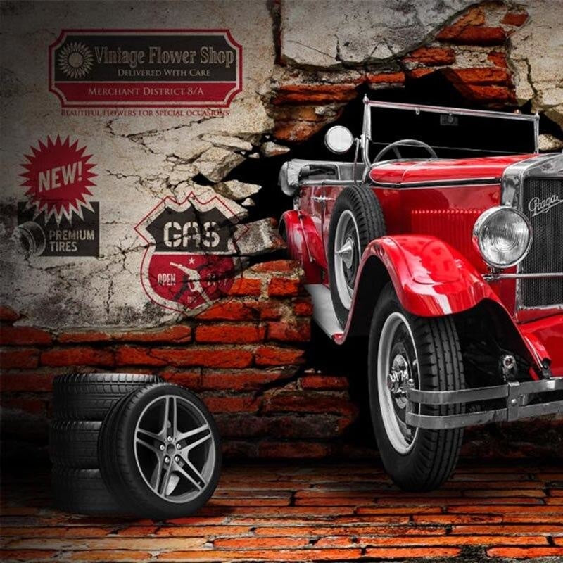 Red vintage car mural installation in automotive showroom space