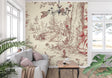 Vintage toile de jouy wallpaper in red and beige tones creating an elegant dining room atmosphere