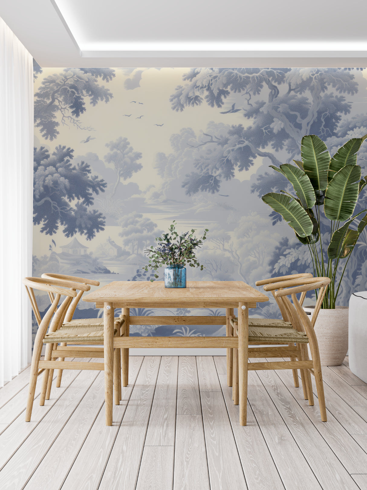 Blue Toile de Jouy wallpaper in elegant living room setting with natural light and classic furniture