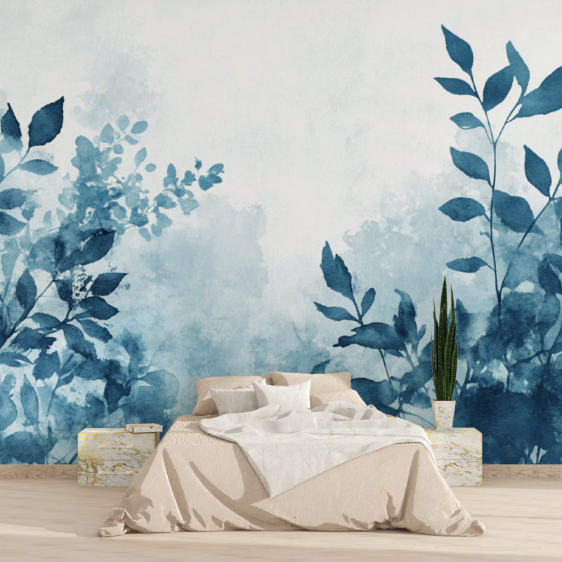 Blue foliage wallpaper adding elegance to a home office space