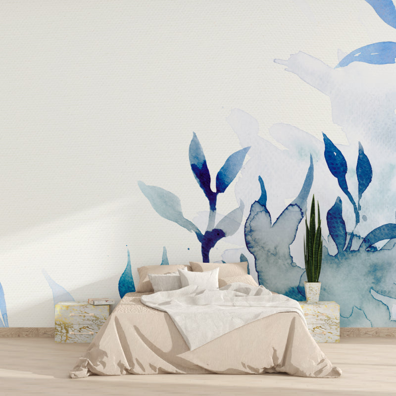 Watercolor leaf mural in master bedroom with natural light highlighting blue tones