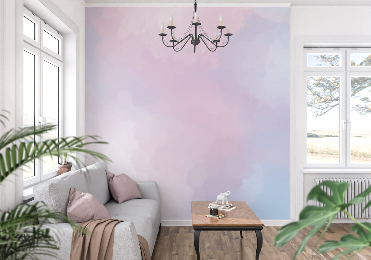 Watercolor gradient wallpaper in modern living room showing soft pink and blue tones creating a calm atmosphere