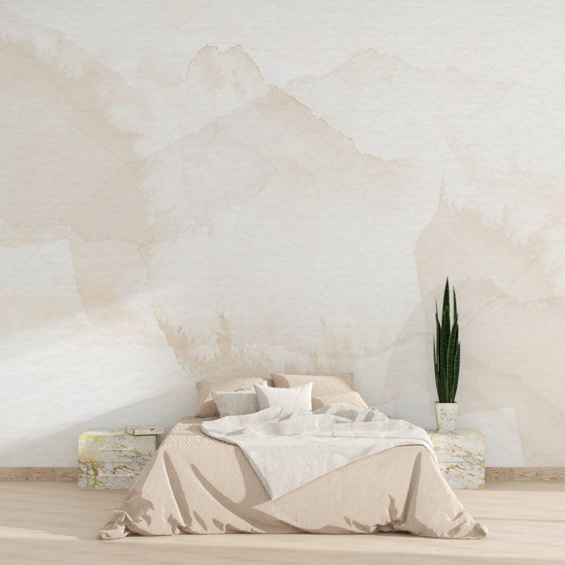 Watercolor abstract wallpaper in modern living room showing soft beige tones and natural light