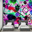 Western desert wallpaper creating a cozy atmosphere in a kid's bedroom with toy horses and cowboy decor