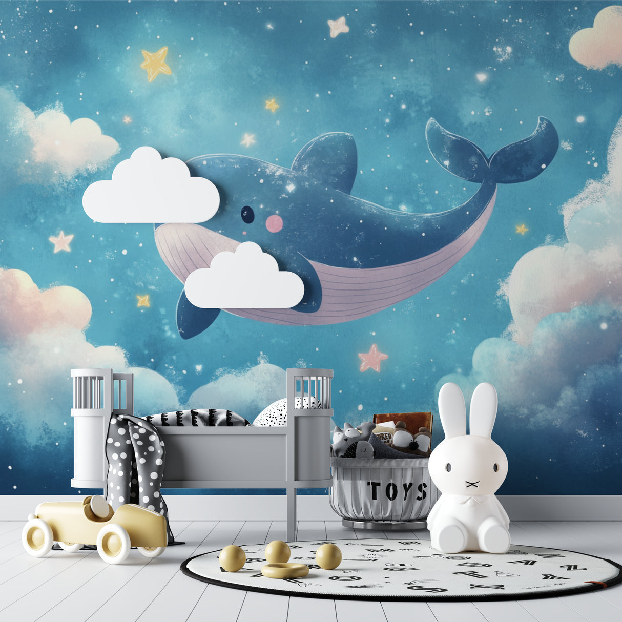 Night sky whale mural wallpaper in a modern nursery setup