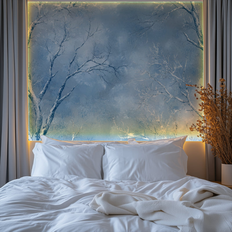Winter tree mural wallpaper creating a peaceful atmosphere in a modern living room with minimal furniture
