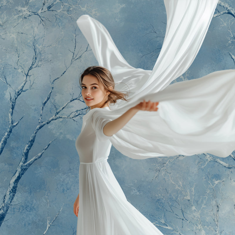 Frosty tree mural in a reading nook with comfortable seating