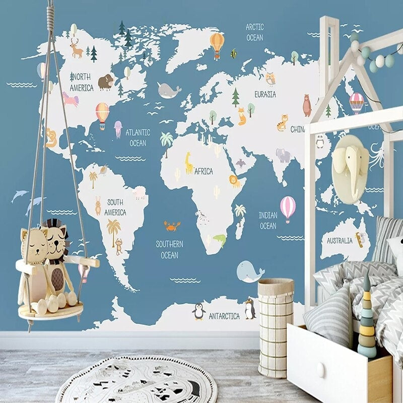 Kids play area showing full world map mural installation