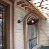 Vintage Wall Sconce  Black Metal Curved Arm Design - Product example