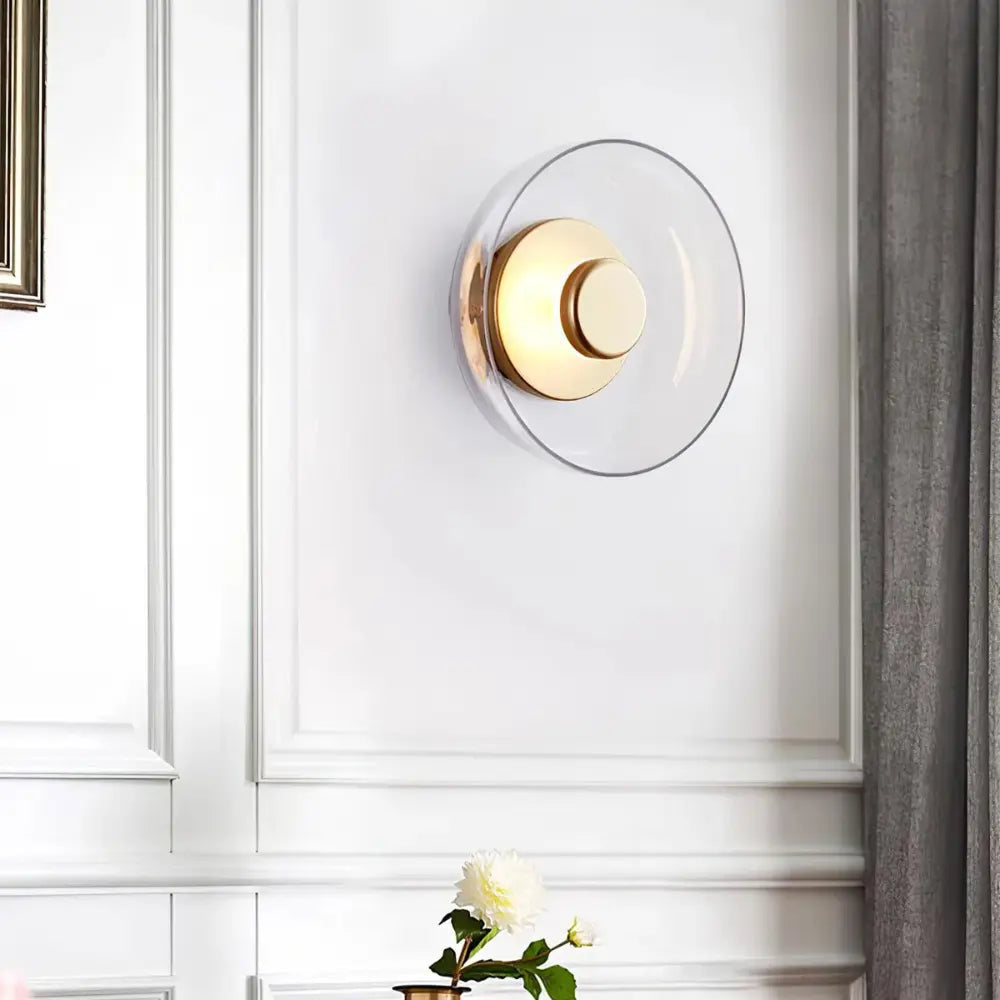 Modern Glass Wall Light  Clear Disc with Brass Accent - Product example