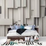 Abstract geometric wallpaper bringing depth to a master bedroom with minimal decor