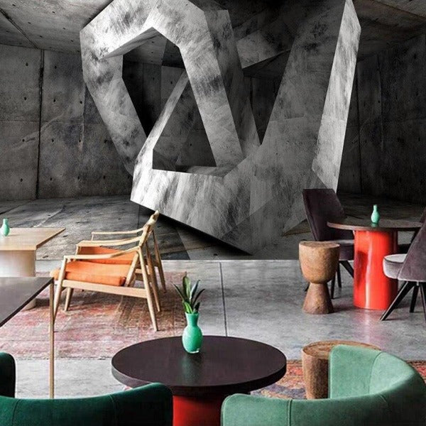 Geometric concrete wallpaper making statement in contemporary office space with glass desk and black chairs