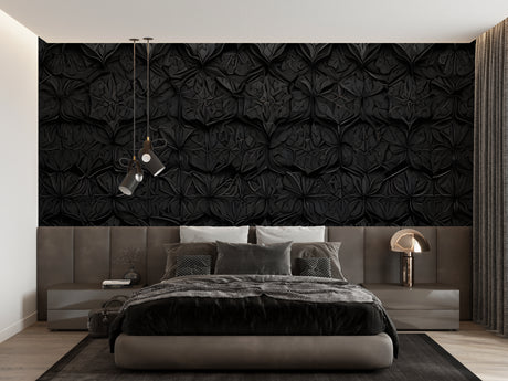 Modern black 3D geometric wallpaper creating depth in a minimalist living room setting