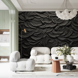 Dramatic black 3D feather wallpaper creating depth in master bedroom setting