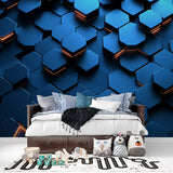 Home office with geometric 3D wallpaper in blue and copper tones