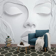 3D relief wallpaper creating dramatic shadows in modern minimalist living room, soft natural lighting highlights sculptural details