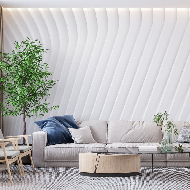 White 3D wave wallpaper creating depth in a modern living room with minimalist furniture
