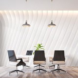Modern white 3D wallpaper bringing movement to an office space with clean lines