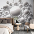 Modern living room showcasing 3D Bubble Pattern Wallpaper with silver spheres creating depth and movement on feature wall