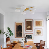 Modern Ceiling Light  Brass Arms White Glass Shades - Product example