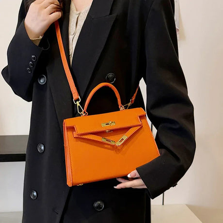 Luxury Leather Mini Bag  Structured Orange Design With Gold Hardware - Product showcase