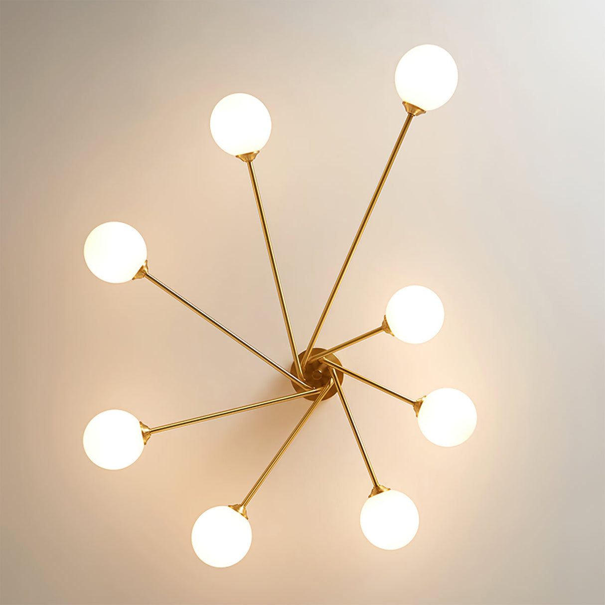 Modern Molecular Ceiling Light  Brass Arms White Glass Globes - Product example