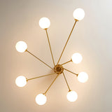 Modern Molecular Ceiling Light  Brass Arms White Glass Globes - Product example