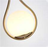 Modern Wall Sconce  Teardrop Globe Design - Product example