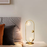 Modern Glass Table Lamp  Brass Ring Design with Spherical Diffusers - Product example