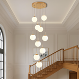 Modern Staircase Chandelier  Cascading Glass Spheres With Gold Trim - Product showcase