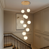 Modern Staircase Chandelier  Cascading Glass Spheres With Gold Trim - Detailed view