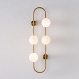 Modern Wall Sconce  Brass Arch Glass Globe Design - Detailed view