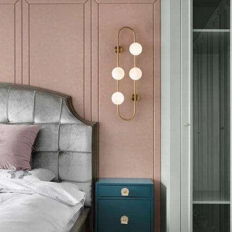 Modern Wall Sconce  Brass Arch Glass Globe Design - Product example