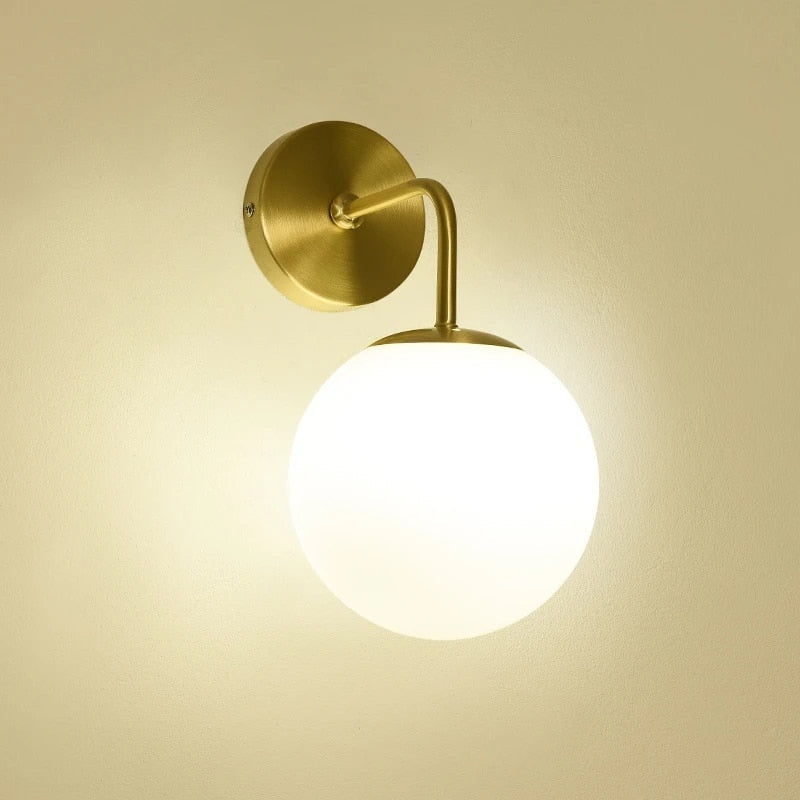 Scandinavian Globe Wall Light  Brass Finish with Adjustable Arm - Detailed view