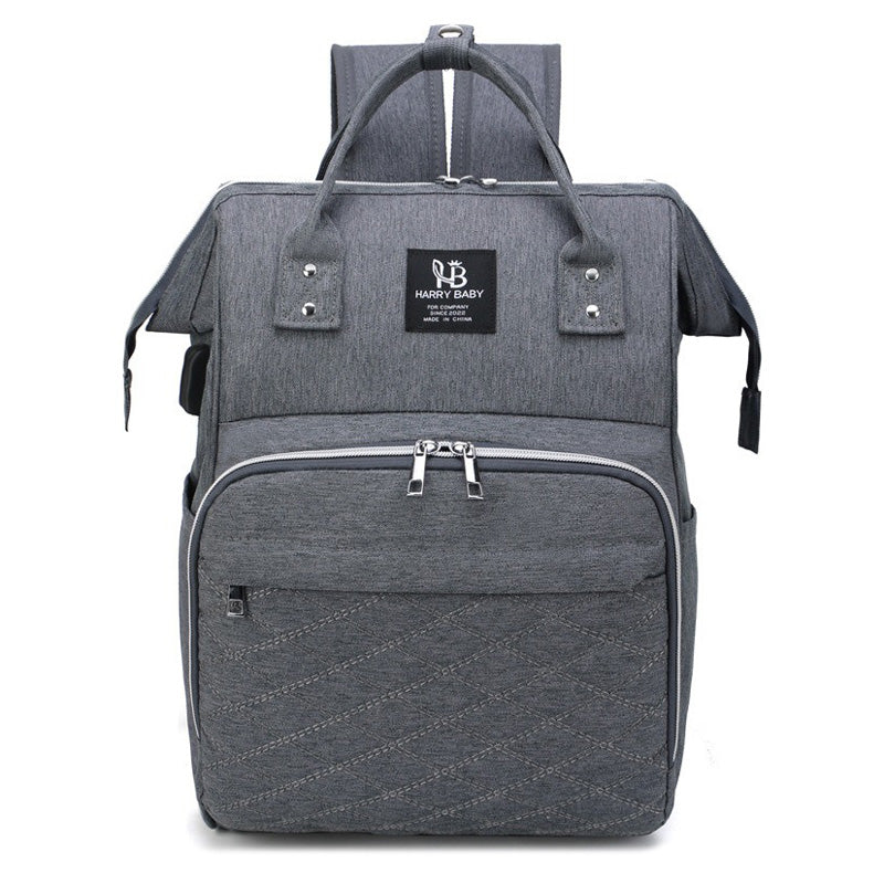 Modern Diaper Backpack  Quilted Design With Multiple Storage - Product example