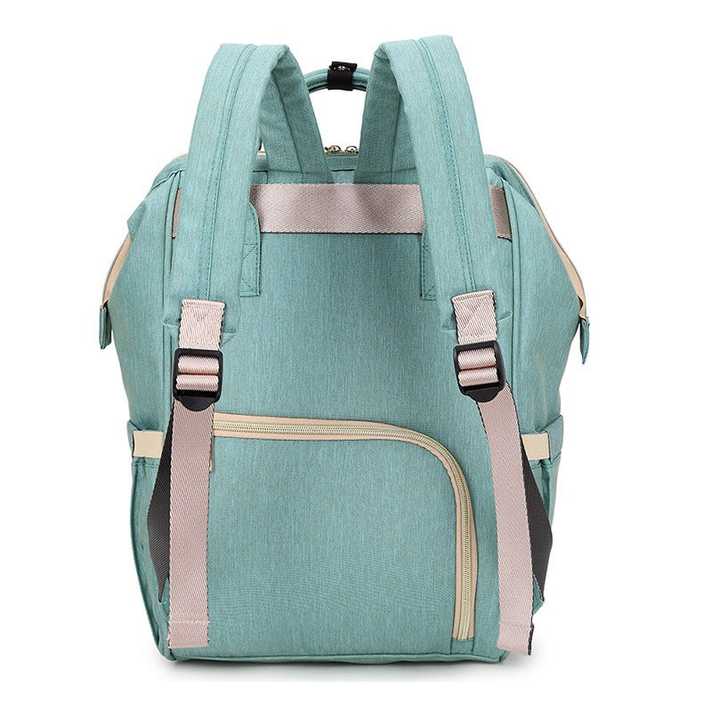 Modern Diaper Backpack  Insulated Bottle Compartment Mint Green - Product example