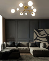 Modern Sputnik Ceiling Light  Brass Arms with Glass Globes - Product example