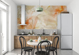 Golden orange watercolor wallpaper making a statement in an elegant dining room