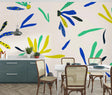 Modern blue and yellow daisy wallpaper mural brightening a sunny dining room with contemporary furniture
