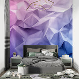 Geometric purple and blue wallpaper creating depth in a stylish dining room setting