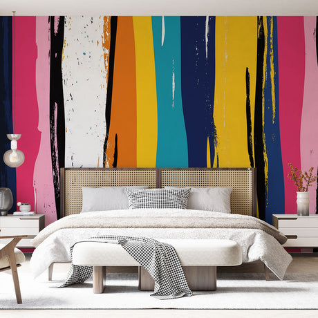 Abstract stripe wallpaper creating a dramatic accent wall in a modern minimalist living room with natural lighting