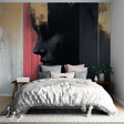 Abstract art wallpaper with dripping effect shown in modern living room, creating dramatic focal point with gold and black tones