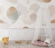 Modern living room featuring abstract beige feather wallpaper with circular patterns creating a calm atmosphere