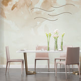 Watercolor leaf wallpaper bringing warmth to a master bedroom