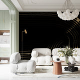 Abstract black and gold wallpaper creating dramatic backdrop in dining room setting