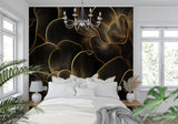 Master bedroom with abstract black and gold wallpaper making statement wall