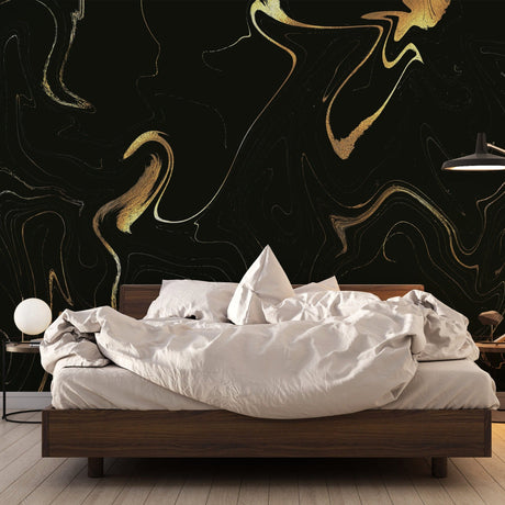 Black and gold marble wallpaper creating a stunning accent wall in a modern living room with ambient lighting