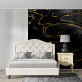 Home office space with elegant black and gold marble wallpaper
